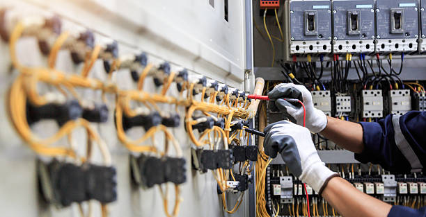 Professional Electrician technician working in Bondurant, IA
